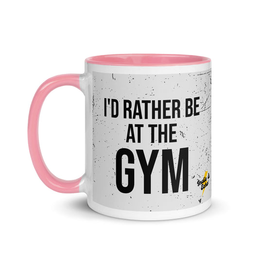 Pink handled mug with I'd rather be at the gym written on it, across a grey splatter background. A gift for someone who loves the gym.