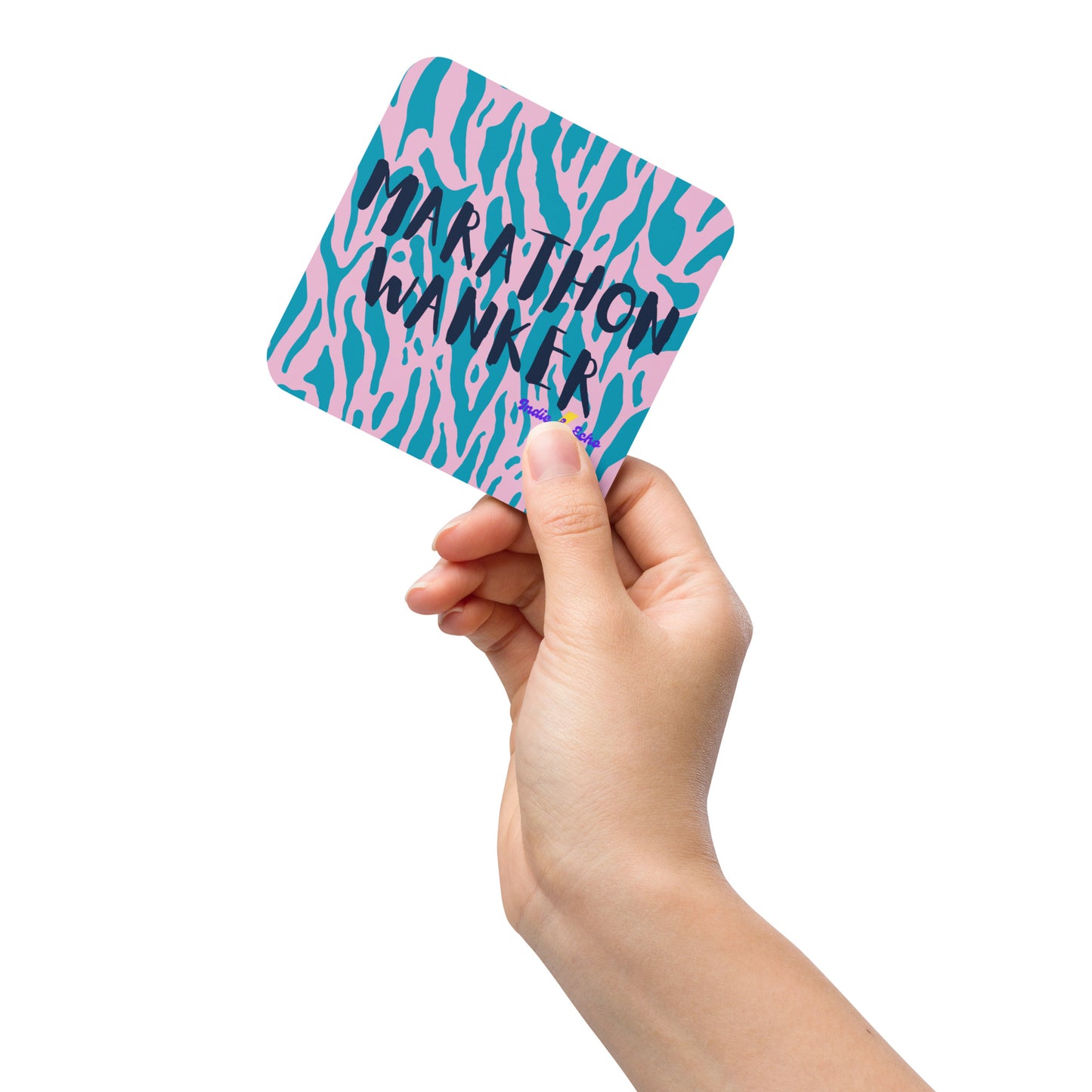 person holding a drinks coaster with a pink and blue leopard print design, and the words marathon wanker across the front