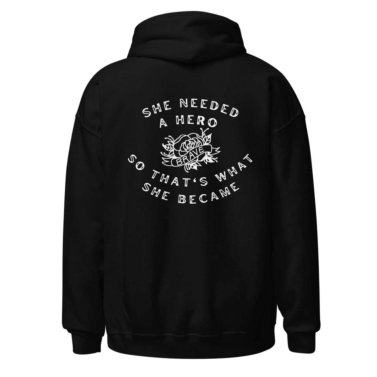 The back of a black hoodie with the words 'she needed a hero, so that's what she became' wrapped around a tattoo style rose with the word 'brave' written in a scroll across it
