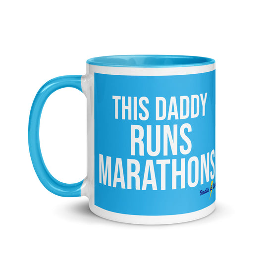 blue and white mug with the words this daddy runs marathons in a bold, white font across the front