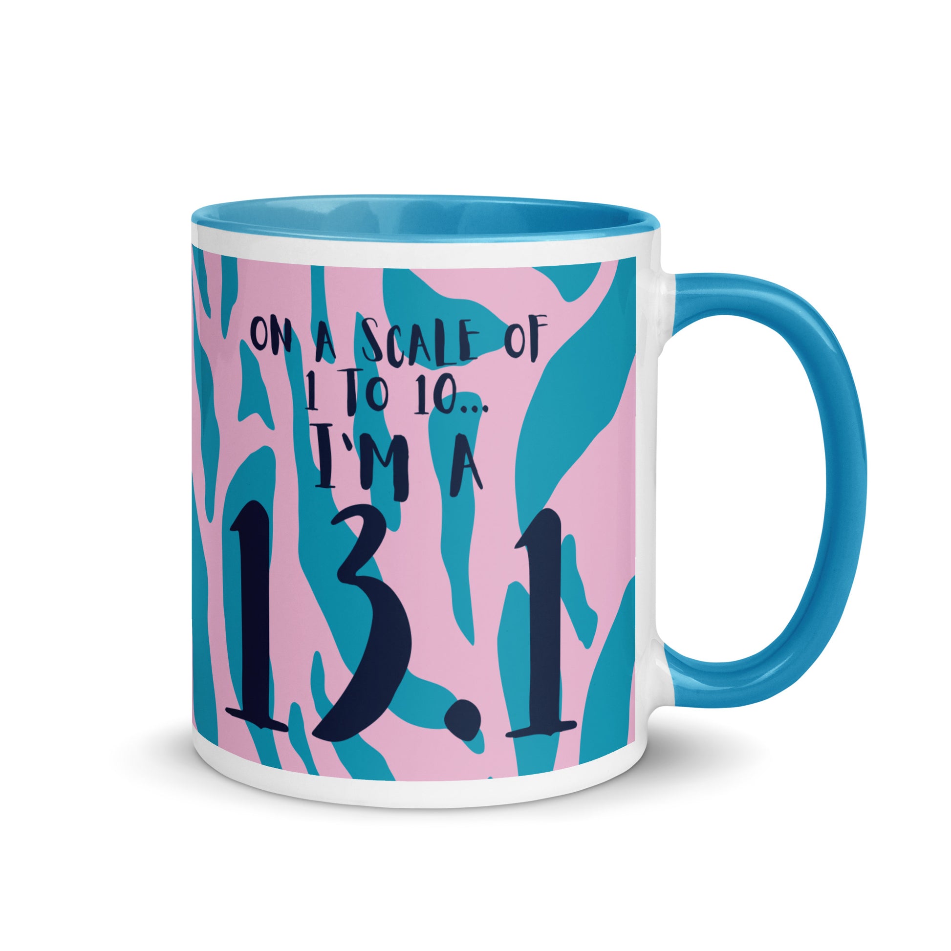 blue rimmed and handled mug with a pink and blue leopard print design and the words on a scale of 1 to 10 I'm a 13.1. A gift for half marathon runners