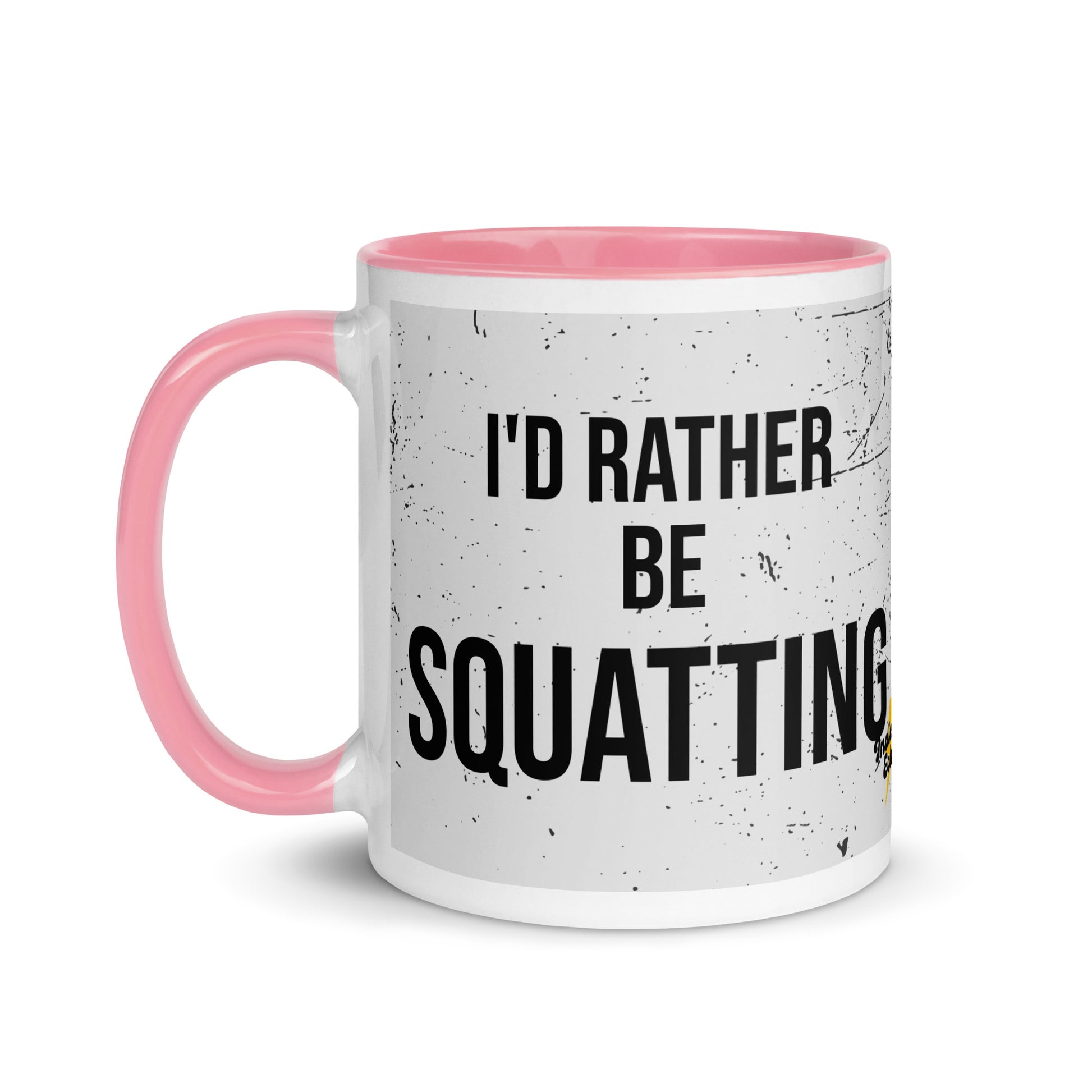 Pink handled mug with I'd rather be squatting written on it, across a grey splatter background. A gift for someone who loves the gym.