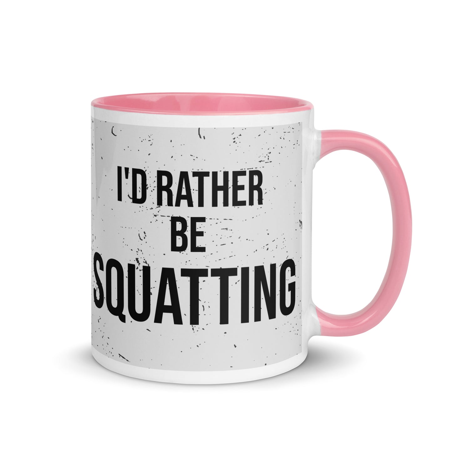 Pink handled mug with I'd rather be squatting written on it, across a grey splatter background. A gift for someone who loves the gym.