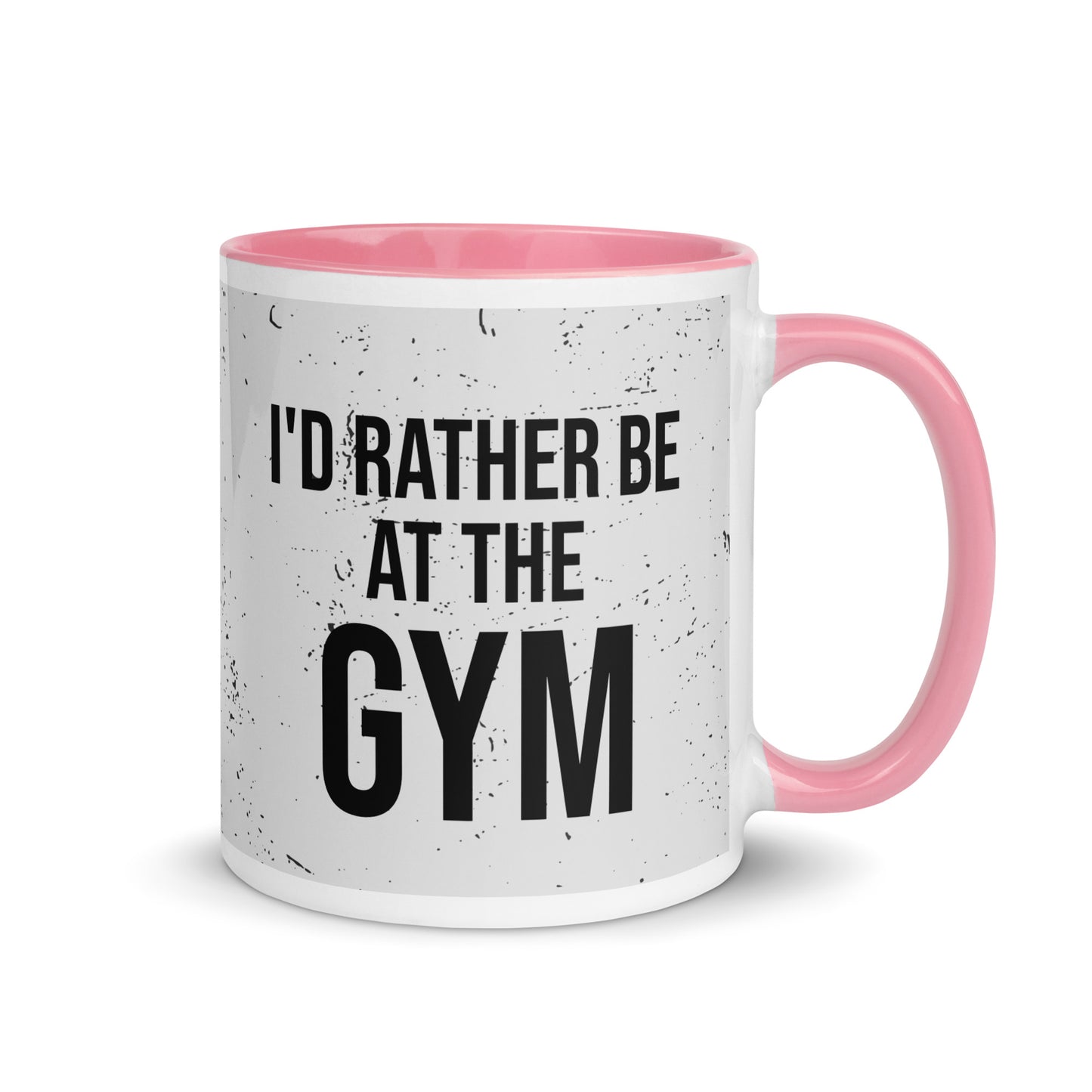 Pink handled mug with I'd rather be at the gym written on it, across a grey splatter background. A gift for someone who loves the gym.