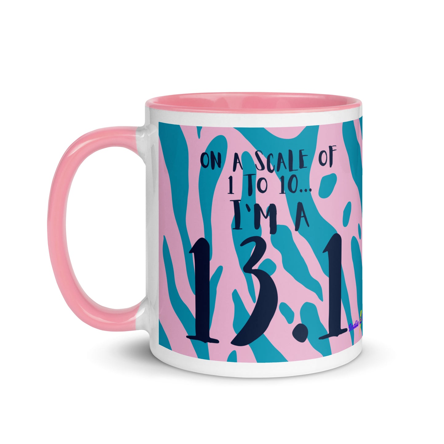 pink rimmed and handled mug with a pink and blue leopard print design and the words on a scale of 1 to 10 I'm a 13.1. A gift for half marathon runners