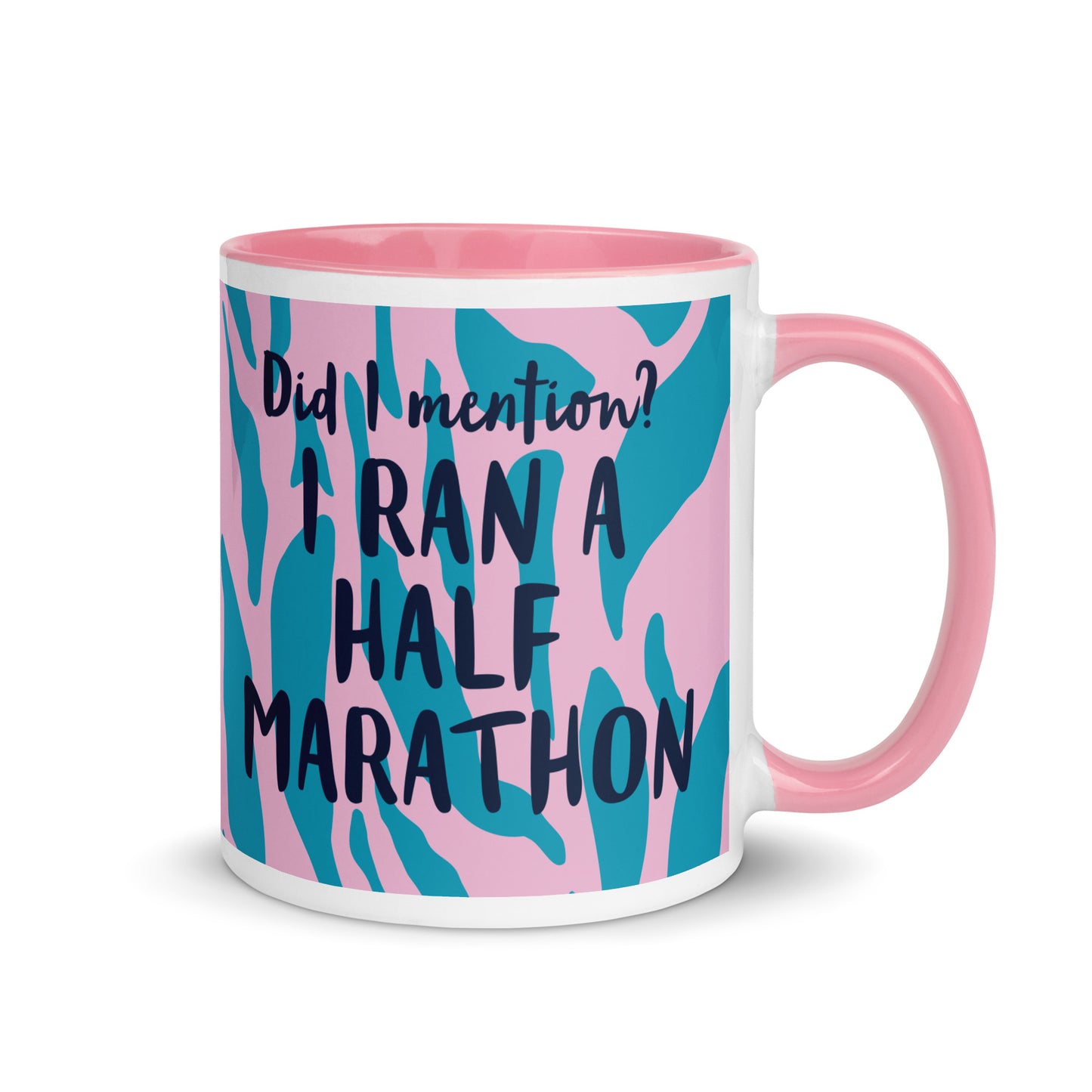 pink handled mug with pink and blue tiger print, and the phrase did i mention? I ran a marathon in a bold font