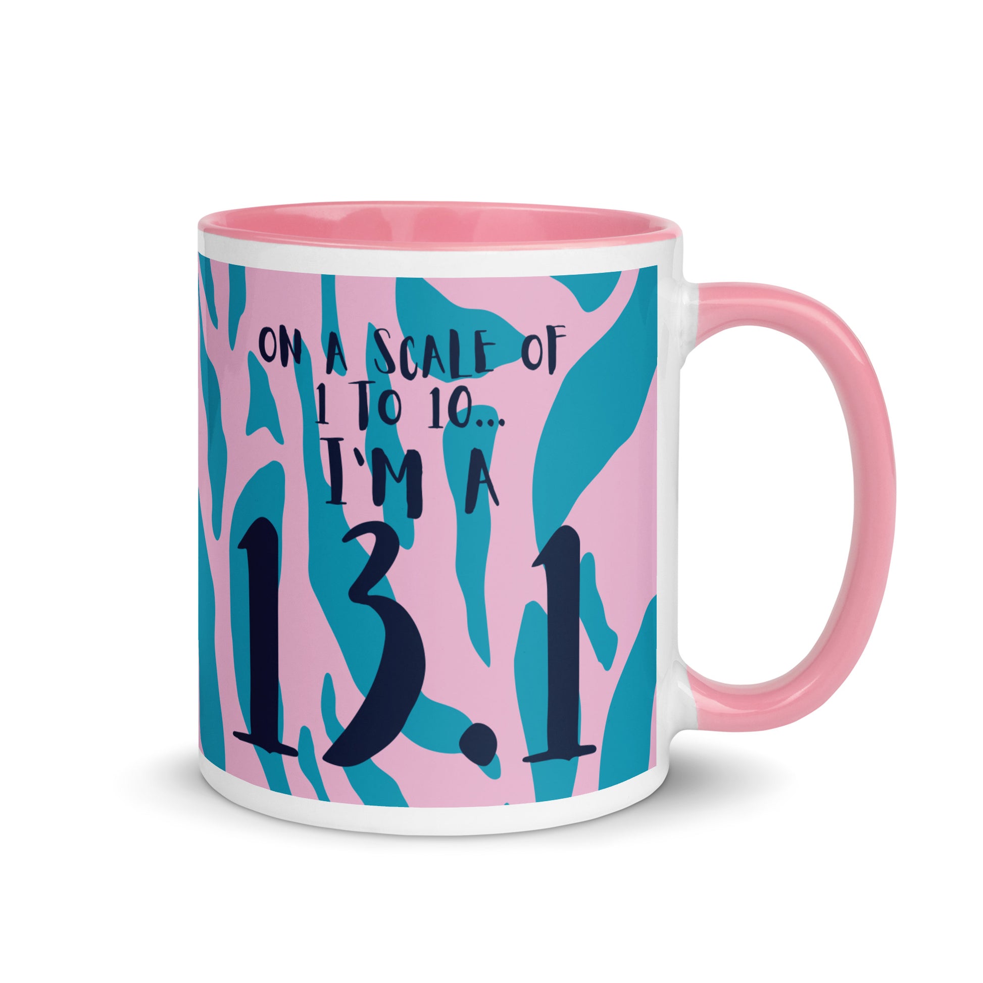 pink rimmed and handled mug with a pink and blue leopard print design and the words on a scale of 1 to 10 I'm a 13.1. A gift for half marathon runners