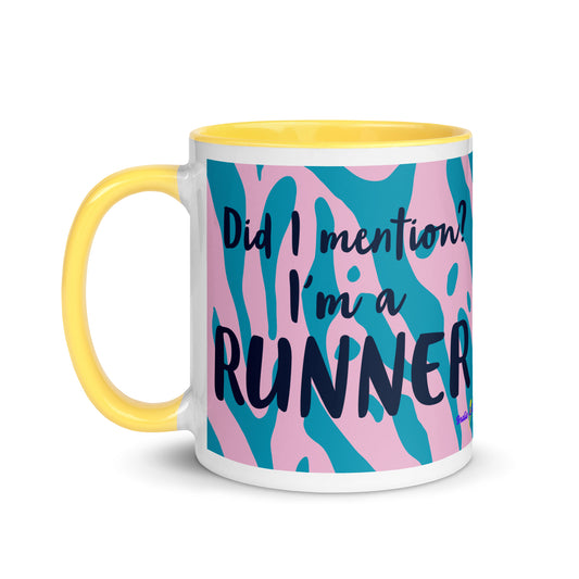 Mug with yellow handle and a blue and pink leopard print design with the phrase did I mention? I'm a runner across the front. A nice gift for a running friend. 