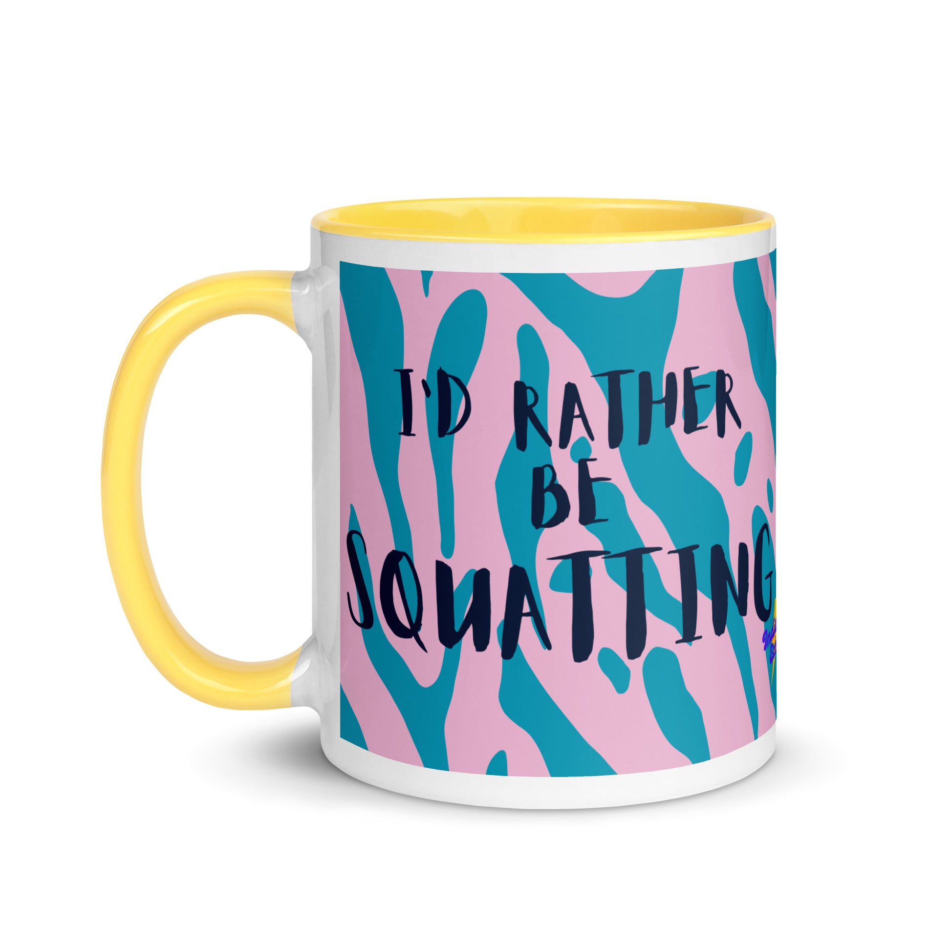 Blue and pink animal print mug with a yellow handle with the words  I'd rather be squatting. A gift for people who love squatting at the gym