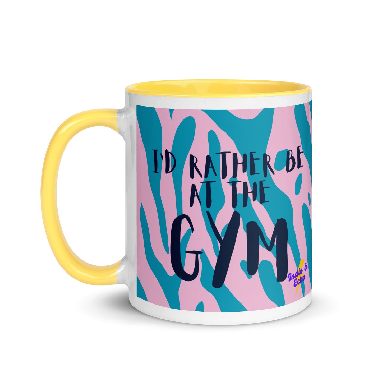 Yellow handled mug with I'd rather be at the gym written on it, across a blue and pink animal print background. A gift for someone who loves the gym.