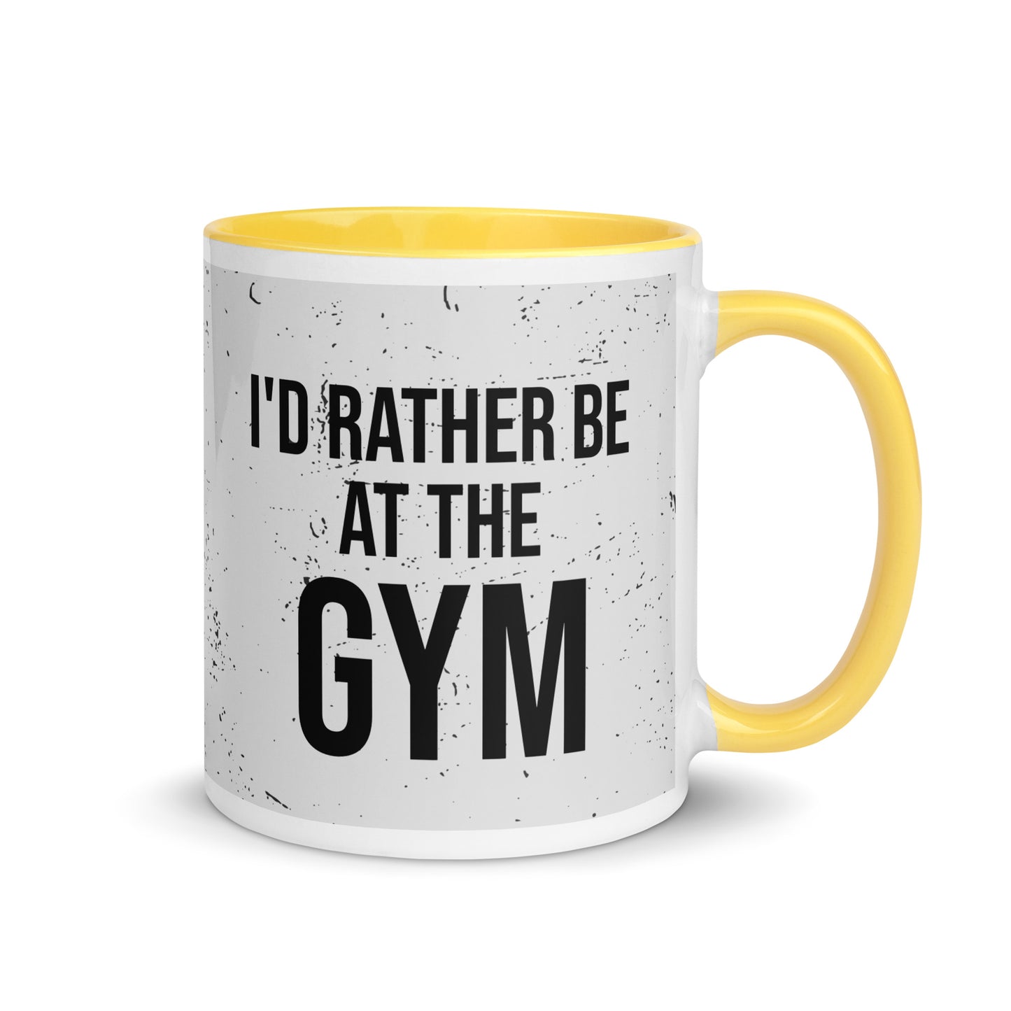Yellow handled mug with I'd rather be at the gym written on it, across a grey splatter background. A gift for someone who loves the gym.