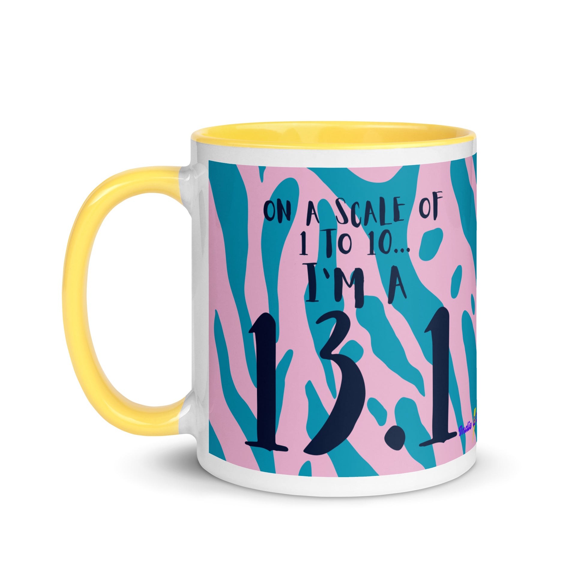 yellow rimmed and handled mug with a pink and blue leopard print design and the words on a scale of 1 to 10 I'm a 13.1. A gift for half marathon runners
