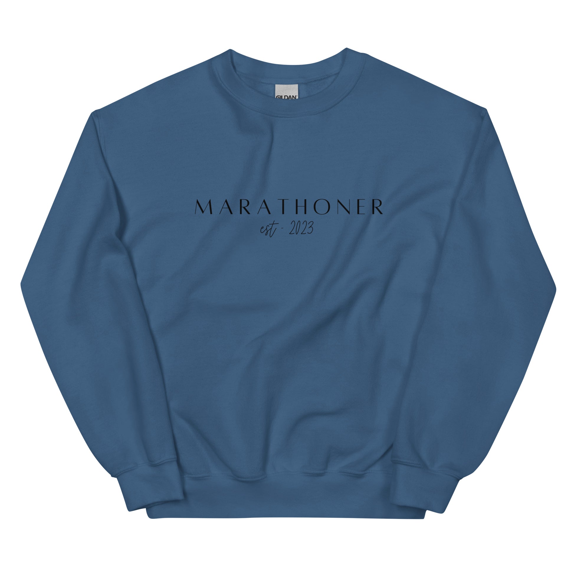 blue sweatshirt with the words Marathoner est 2023 across the chest