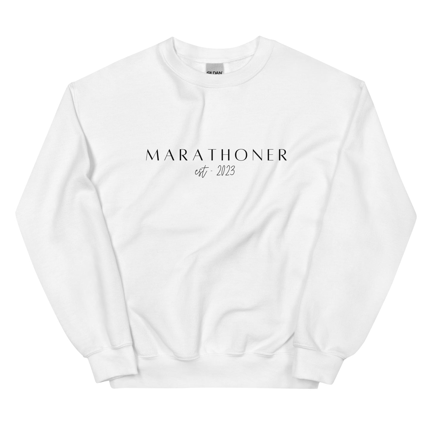 white sweatshirt with the words Marathoner est 2023 across the chest