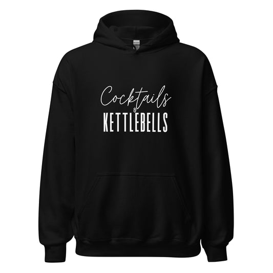 black hoodie with the words cocktails and kettlebells in a white font across the chest