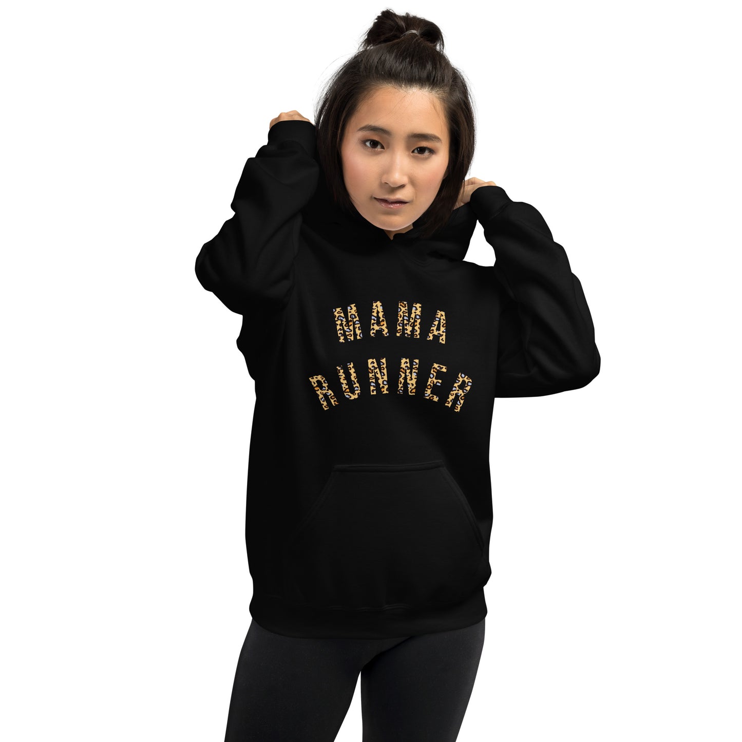 woman wearing a black hoodie with the words mama runner in a leopard print font, across the chest