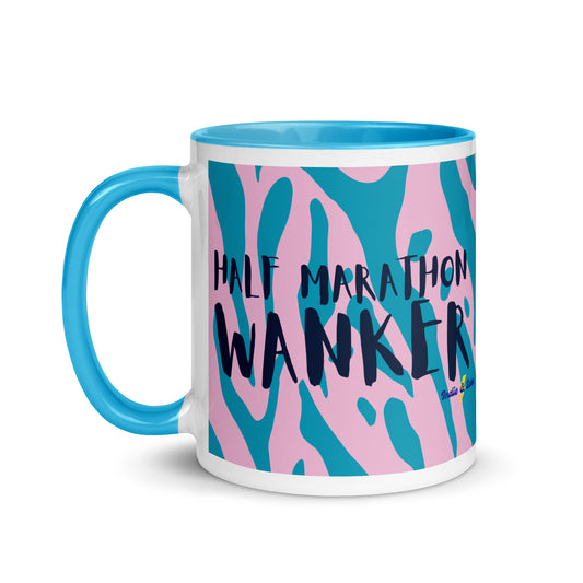Blue and white mug with half marathon wanker written across the side, with a blue and pink animal print background