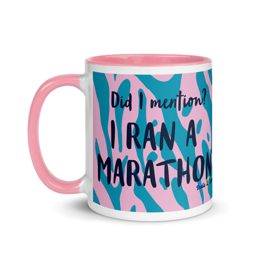 pink handled coffee mug with a pink and blue leopard print design, with the words did i mention? I ran a marathon in a bold font  
